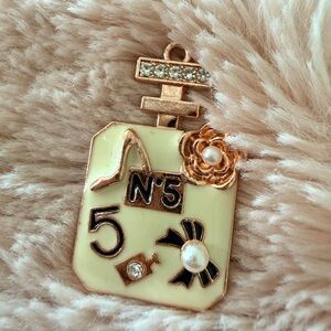 Chic Perfume Bottle Pendant with Pearl Accents